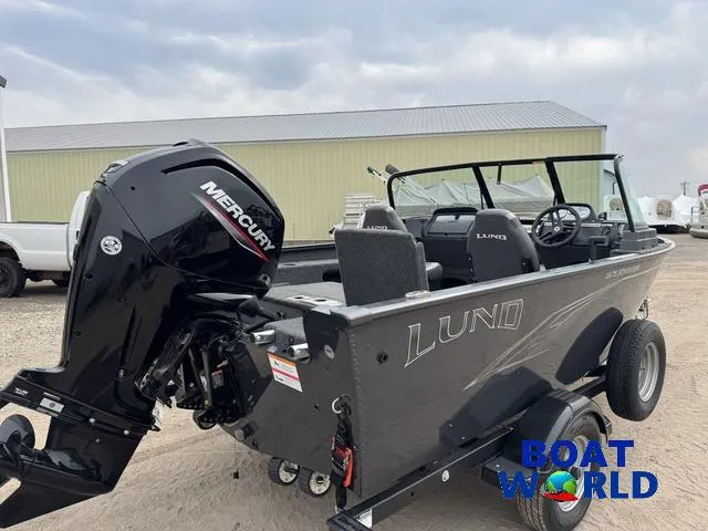 Slide: The Image of 2021 Lund 1675 Adventure Sport boat with Mercury engine, displayed outdoors at Boat World. - 38