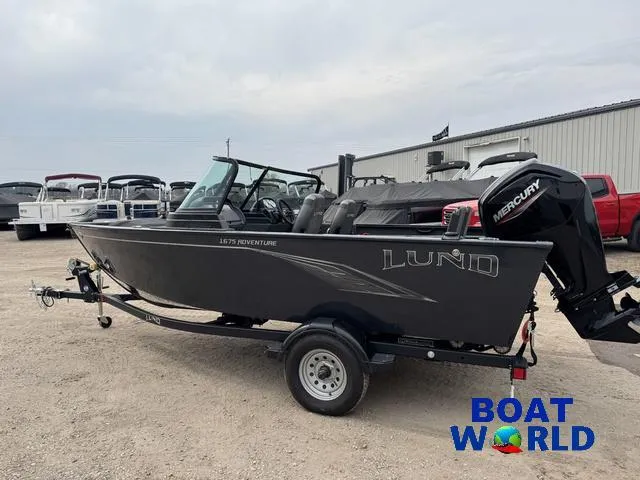 Slide: The Image of 2021 Lund 1675 Adventure Sport boat with Mercury engine, displayed at Boat World dealership. - 41