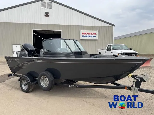 Slide: The Image of 2021 Lund 1675 Adventure Sport boat on trailer at dealership. - 49