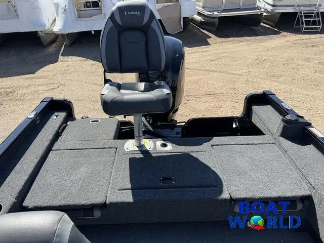 Slide: The Image of 2021 Lund 1675 Adventure Sport boat interior with seating, displayed at Boat World. - 7