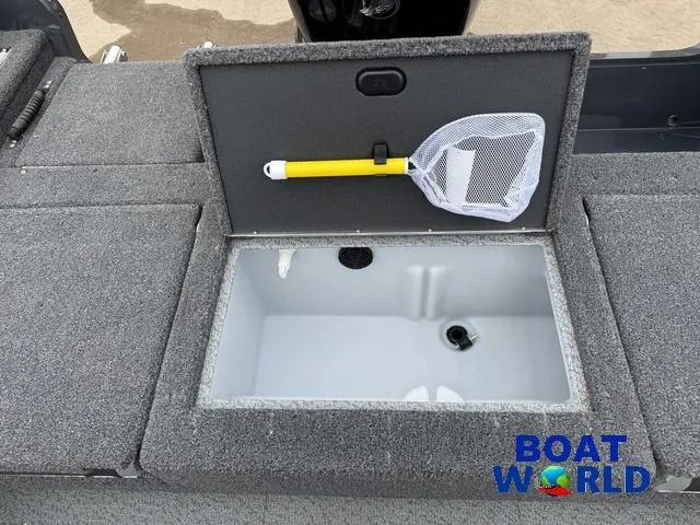 Slide: The Image of 2021 Lund 1675 Adventure Sport boat storage compartment with net, labeled "Boat World." - 9