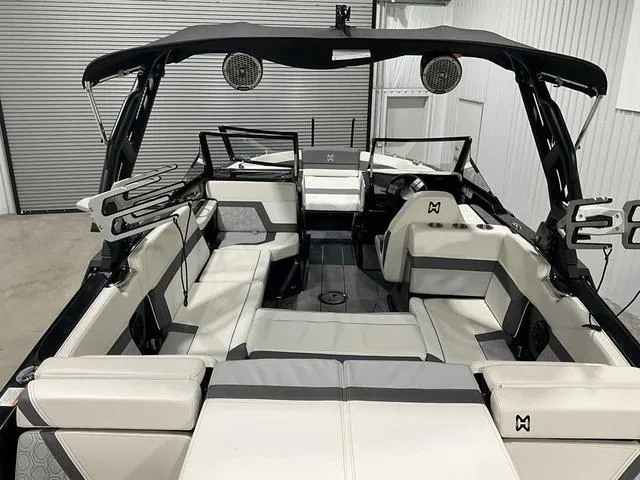 Slide: The Image of 2022 Heyday H22 boat interior with spacious seating and modern design. - 11