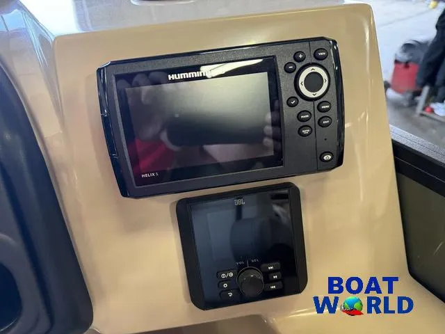 Slide: The Image of Control panel of 2025 Bentley Pontoons Legacy 220 with Humminbird Helix and JBL systems. - 15