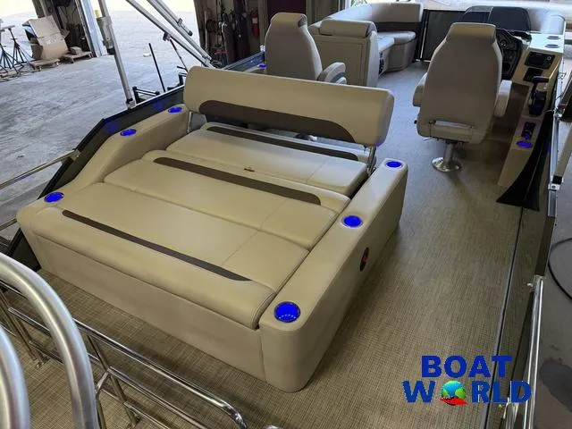 Slide: The Image of 2025 Bentley Pontoons Legacy 220 Swingback interior with Honda 4-Stroke EFI engine, showcased at Boat World. - 22