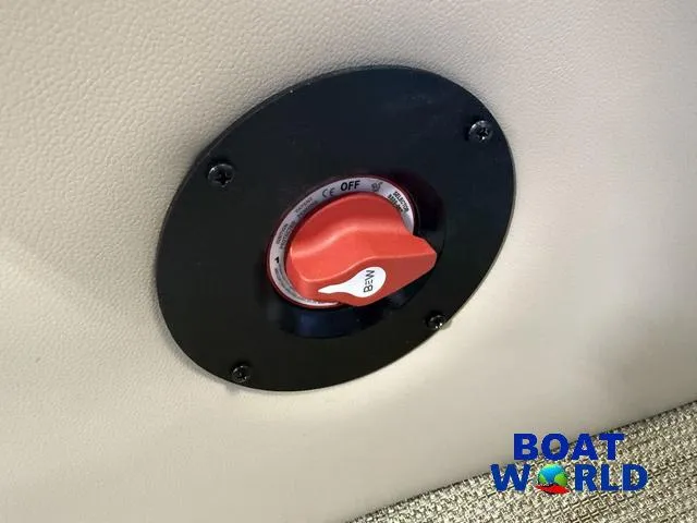 Slide: The Image of Red switch on 2025 Bentley Pontoons Legacy 220 Swingback, labeled "Boat World." - 23