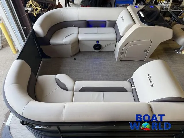 Slide: The Image of 2025 Bentley Pontoons Legacy 220 Swingback interior with luxurious seating and modern design. - 3