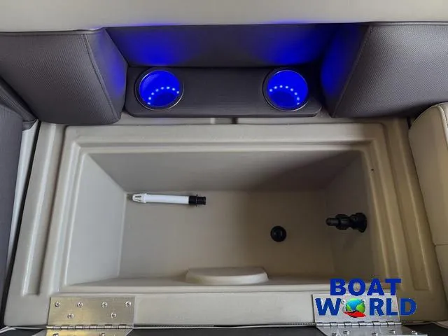 Slide: The Image of Interior of 2025 Bentley Pontoons Legacy 220 with illuminated cup holders and storage compartment. - 30