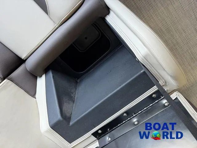 Slide: The Image of 2025 Bentley Pontoons Legacy 220 Swingback interior detail with storage compartment. - 31