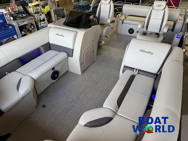 Slide: The Image of 2025 Bentley Pontoons Legacy 220 Swingback interior with luxurious seating and modern design. - 32