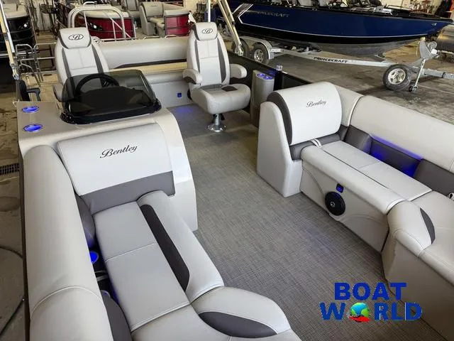 Slide: The Image of 2025 Bentley Pontoons Legacy 220 Swingback interior with luxurious seating and modern design. - 33