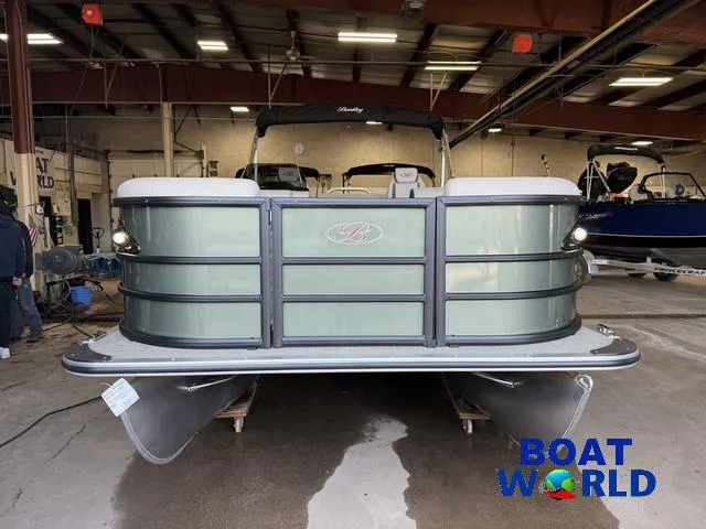 Slide: The Image of 2025 Bentley Pontoons Legacy 220 Swingback with Honda 4-Stroke EFI in a showroom. - 35