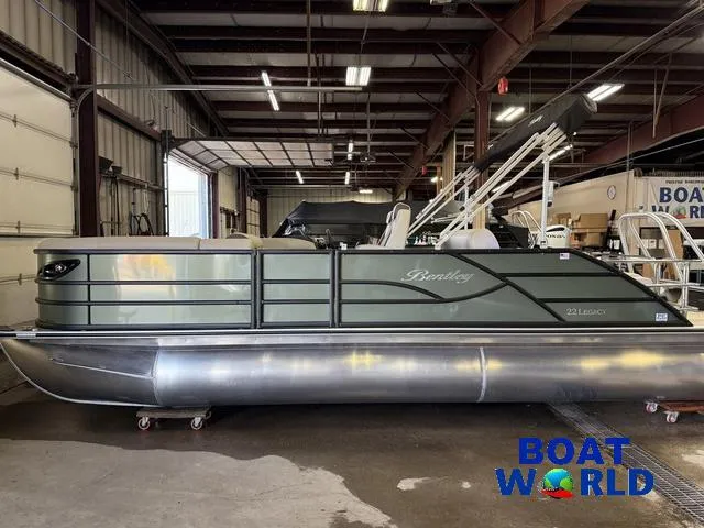 Slide: The Image of 2025 Bentley Pontoons Legacy 220 Swingback with Honda 4-Stroke EFI in a showroom. - 37