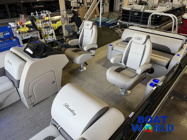Slide: The Image of 2025 Bentley Pontoons Legacy 220 Swingback interior with Honda 4-Stroke EFI, showcased at Boat World. - 4