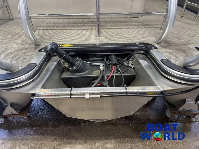 Slide: The Image of 2025 Bentley Pontoons Legacy 220 Swingback engine compartment with Honda 4-Stroke EFI, Boat World logo. - 43