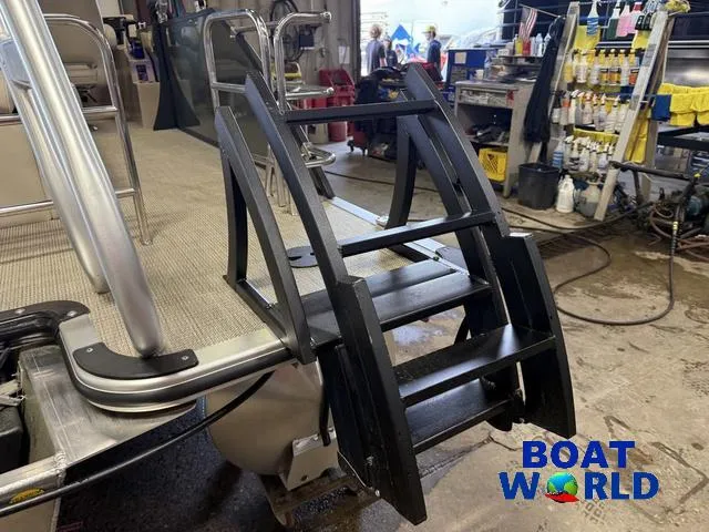 Slide: The Image of 2025 Bentley Pontoons Legacy 220 Swingback with Honda 4-Stroke EFI, featuring a sturdy boarding ladder. - 45