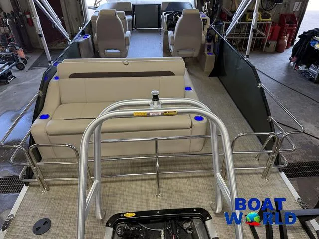 Slide: The Image of 2025 Bentley Pontoons Legacy 220 Swingback interior with Honda 4-Stroke EFI engine, showcased at Boat World. - 6