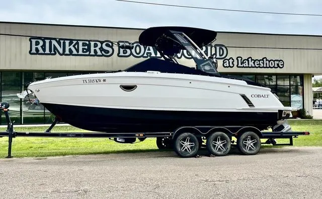 Slide: The Image of 2023 Cobalt R6 Surf boat on trailer at Rinkers Boat World dealership. - 3