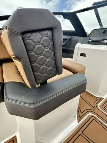 Slide: The Image of 2023 Cobalt R6 Surf boat seat with hexagonal pattern and luxurious design. - 40