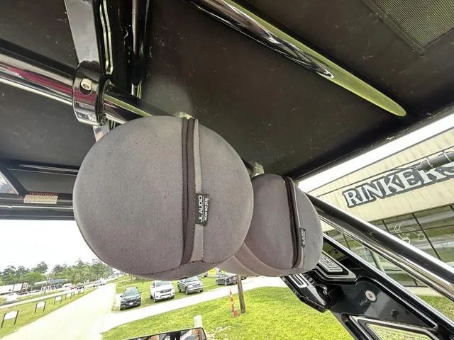 Slide: The Image of 2023 Cobalt R6 Surf boat speakers with protective covers, outdoor setting. - 49