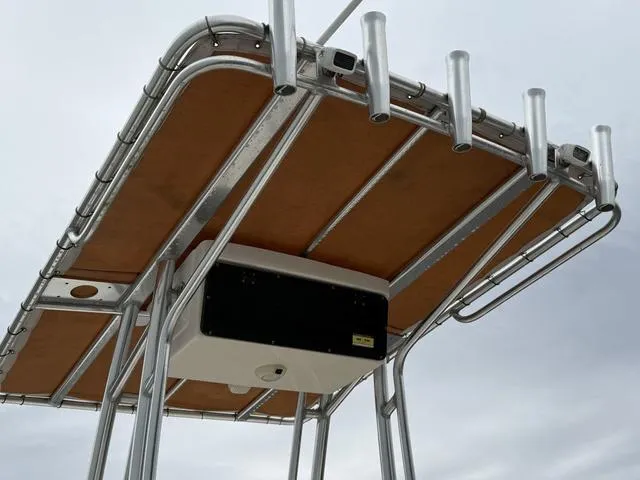 Slide: The Image of Aluminum T-top on 2016 Key West 189FS boat, featuring rod holders and storage. - 12