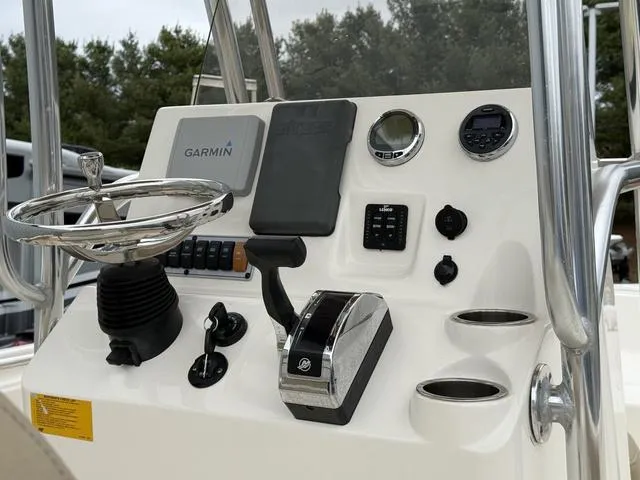 Slide: The Image of 2016 Key West 189FS boat console with Garmin navigation and control panel. - 14