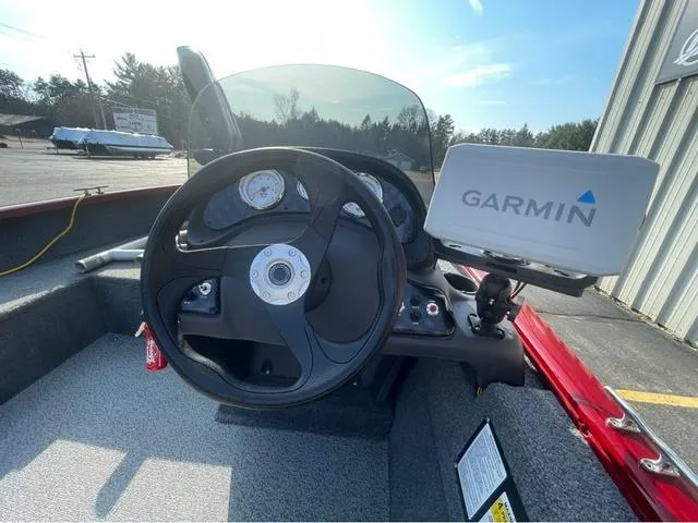 Slide: The Image of 2019 Tracker Super Guide™ V-16 SC boat dashboard with Garmin navigation system. - 13