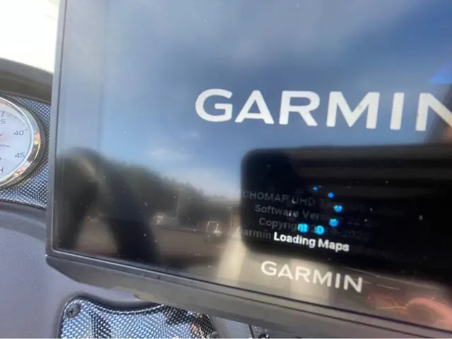 Slide: The Image of Garmin GPS loading maps on 2019 Tracker Super Guide™ V-16 SC boat dashboard. - 15