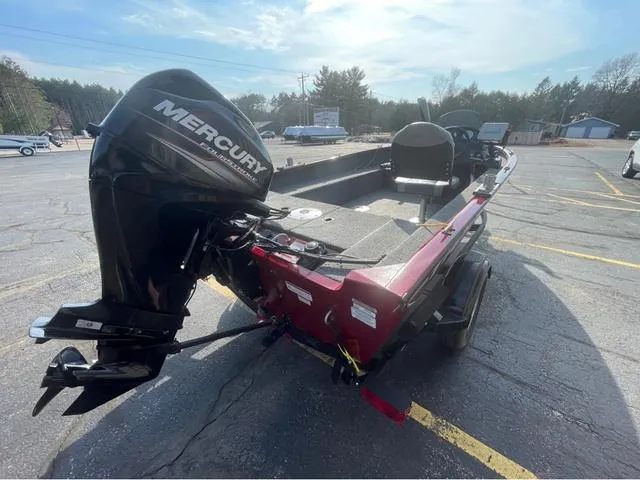Slide: The Image of 2019 Tracker Super Guide™ V-16 SC boat with Mercury outboard motor in parking lot. - 5