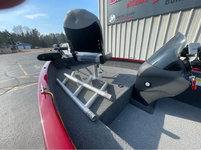 Slide: The Image of 2019 Tracker Super Guide™ V-16 SC boat interior with seat and steering console. - 8