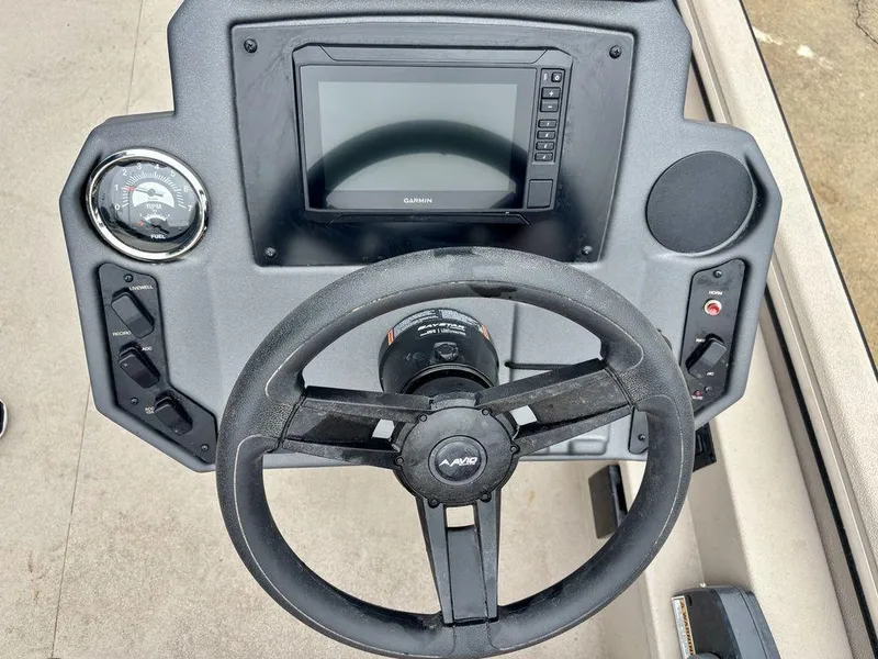 Slide: The Image of Steering console of 2025 Avid 18 Rogue SC boat with Garmin display and controls. - 5