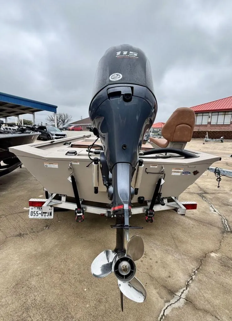 Slide: The Image of 2025 Avid 18 Rogue SC boat with powerful outboard motor on trailer. - 8