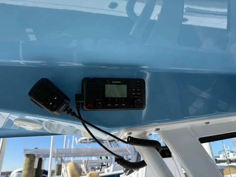 Slide: The Image of 2024 Sportsman Heritage 231 Center Console with marine radio installed. - 12