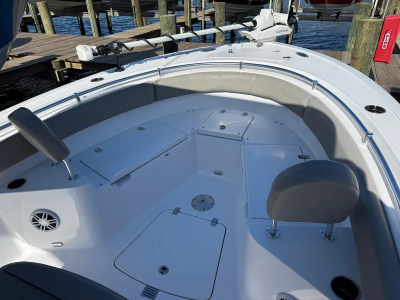 Slide: The Image of 2024 Sportsman Heritage 231 Center Console boat interior with seating and storage compartments. - 20