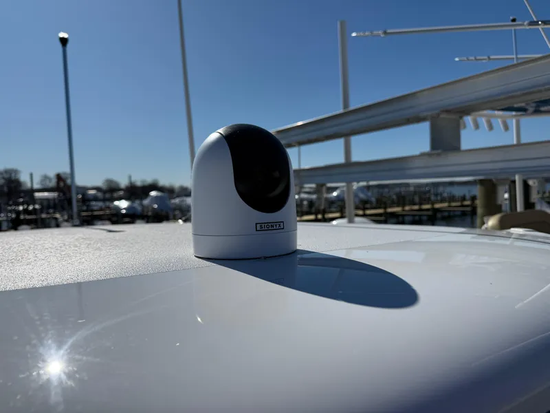 Slide: The Image of 2024 Sportsman Heritage 231 Center Console with mounted camera on deck. - 22