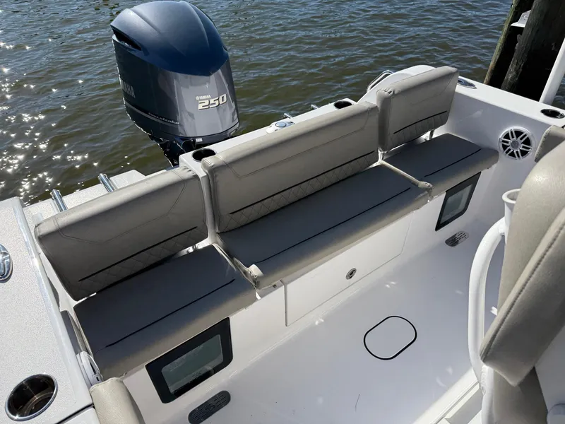 Slide: The Image of 2024 Sportsman Heritage 231 Center Console boat with Yamaha 250 engine, featuring comfortable seating. - 6