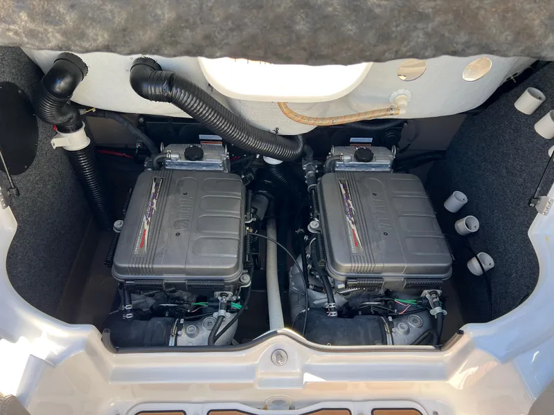 Slide: The Image of Twin engines of a 2008 Yamaha Boats 232 Limited, showcasing detailed engine components. - 28