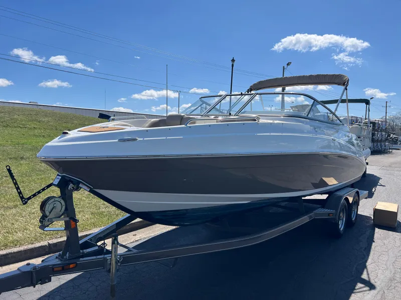 Slide: The Image of 2008 Yamaha Boats 232 Limited on trailer under clear blue sky. - 9