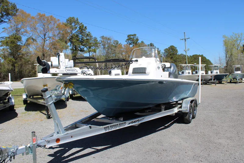 Slide: The Image of 2025 Tidewater 2110 Bay Max boat on trailer in outdoor lot. - 15