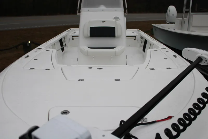 Slide: The Image of 2025 Tidewater 2110 Bay Max boat, white deck, spacious seating, modern design. - 18