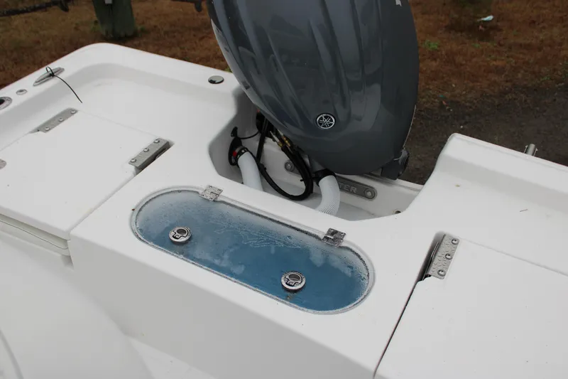 Slide: The Image of 2025 Tidewater 2110 Bay Max boat with motor and livewell. - 25