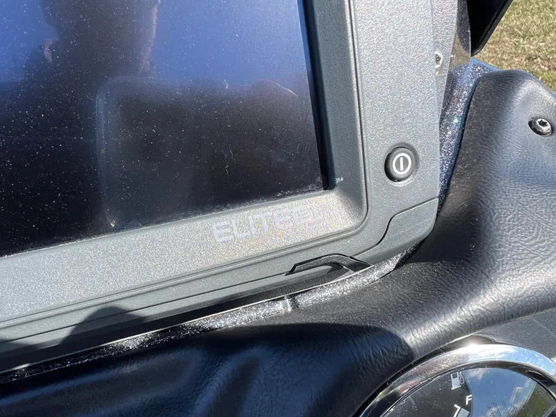 Slide: The Image of Close-up of a 2018 Skeeter ZX 225 boat dashboard with electronic display. - 16