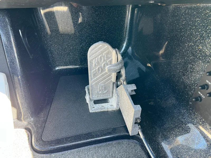 Slide: The Image of 2018 Skeeter ZX 225 boat compartment with a Hot Foot throttle pedal. - 18