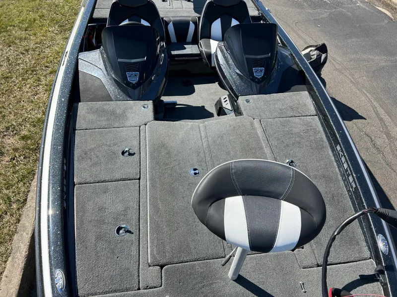 Slide: The Image of 2018 Skeeter ZX 225 fishing boat interior with seating and storage compartments. - 22
