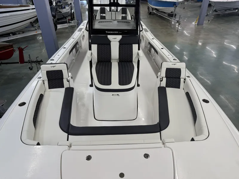 Slide: The Image of 2025 Tidewater 3100 Carolina Bay boat interior with sleek seating and modern design. - 20