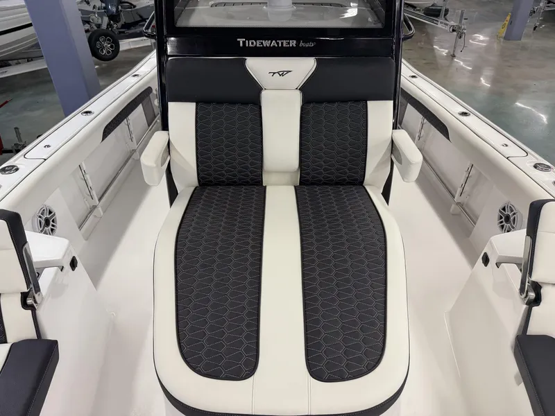 Slide: The Image of 2025 Tidewater 3100 Carolina Bay boat interior with stylish seating and modern design. - 21