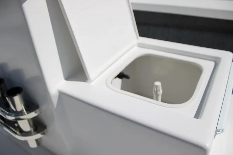 Slide: The Image of Open storage compartment on 2025 Mitzi Skiffs 17 Tournament boat. - 23