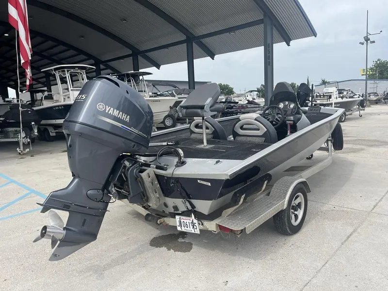 Slide: The Image of 2012 Xpress Xclusive Series X17 boat with Yamaha outboard motor on trailer. - 4