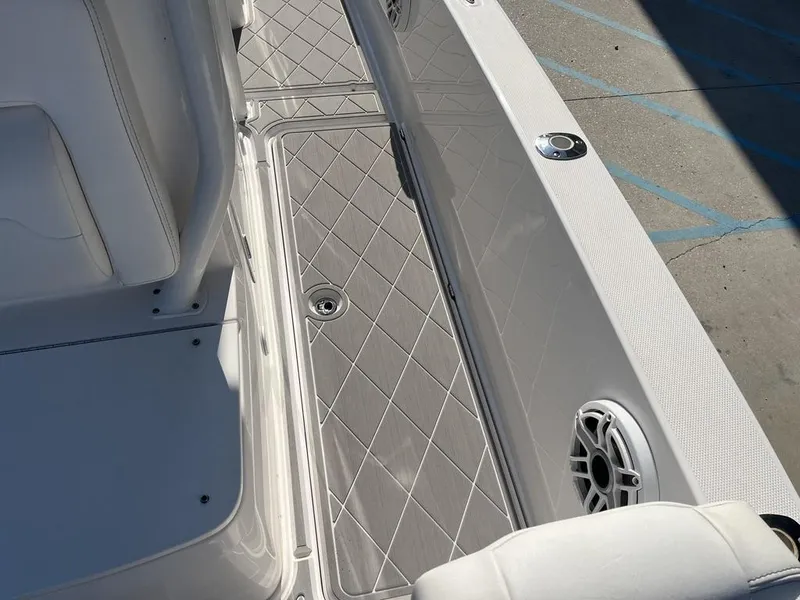 Slide: The Image of Open storage compartment on 2023 Sea Cat 262 Ultimate Edition boat. - 22