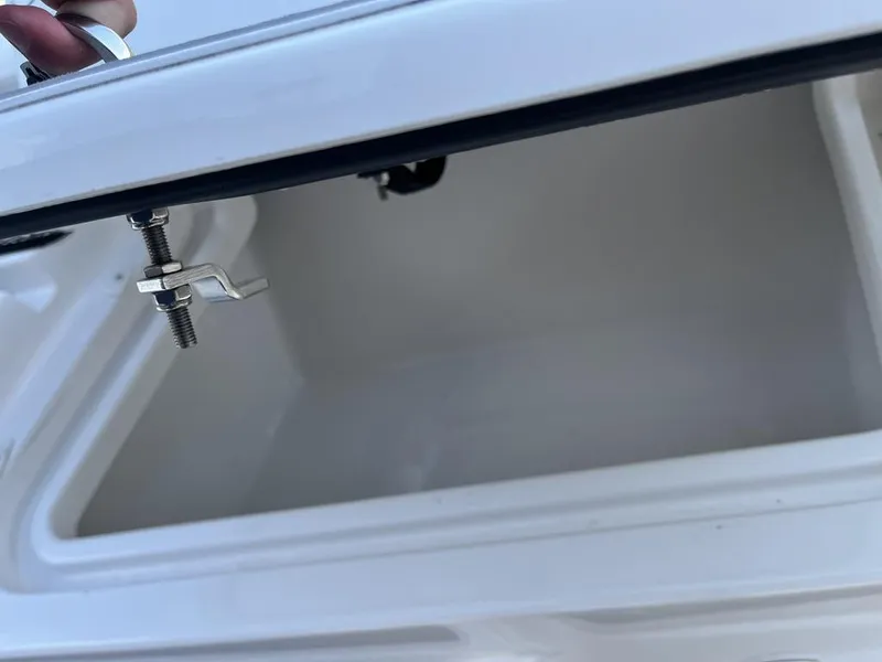 Slide: The Image of 2023 Sea Cat 262 Ultimate Edition boat interior with seating and storage compartments. - 9