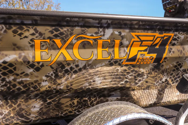 Slide: The Image of 2025 Excel 1751 F4 Shallow Water boat with camouflage design and bold logo. - 12